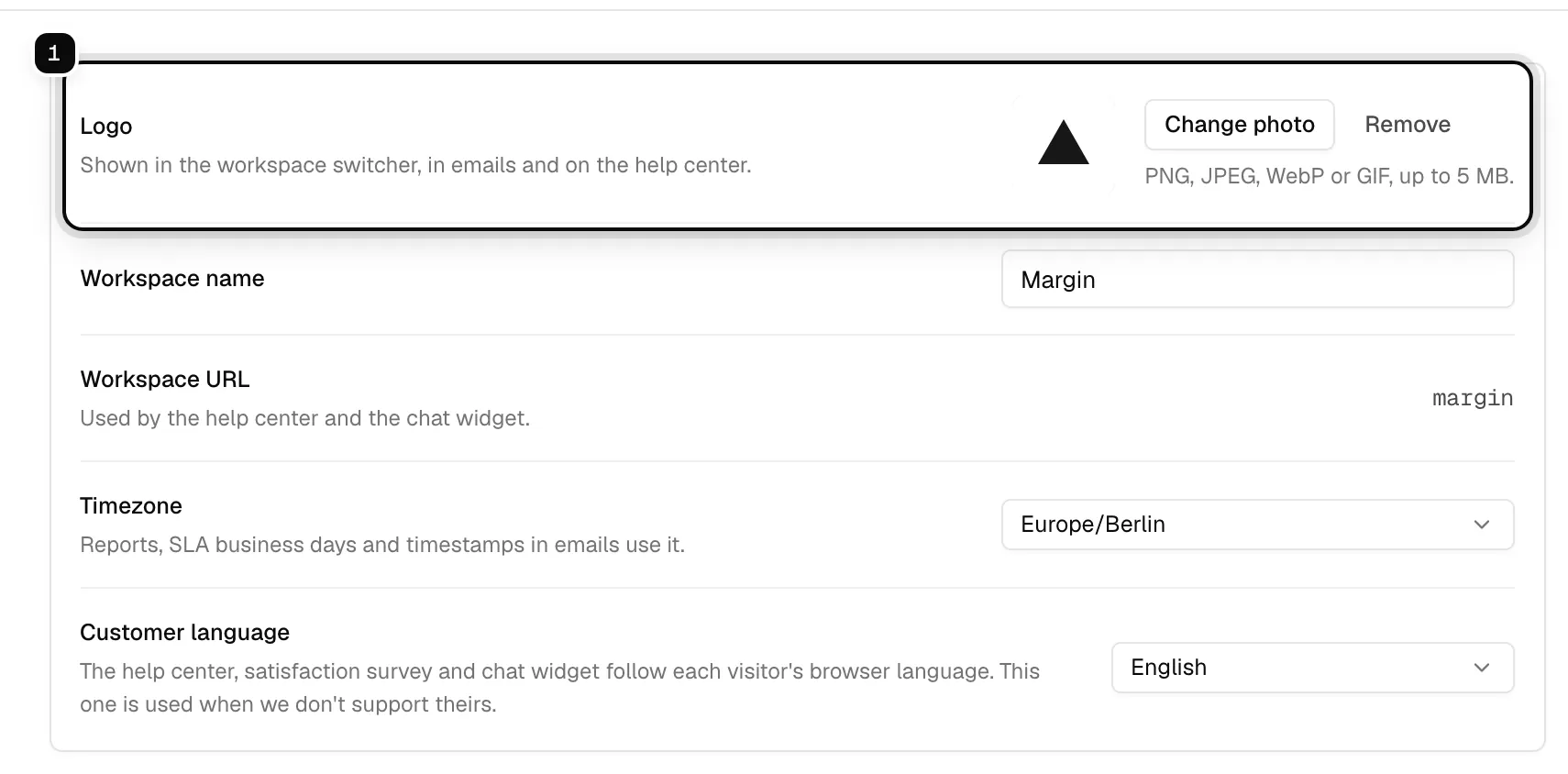 The Logo row in the workspace settings ringed as 1